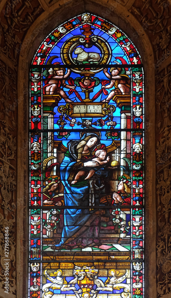 Madonna and Child stained glass window by Filippino Lippi, Filippo Strozzi chapel in Santa Maria Novella Principal Dominican church in Florence, Italy