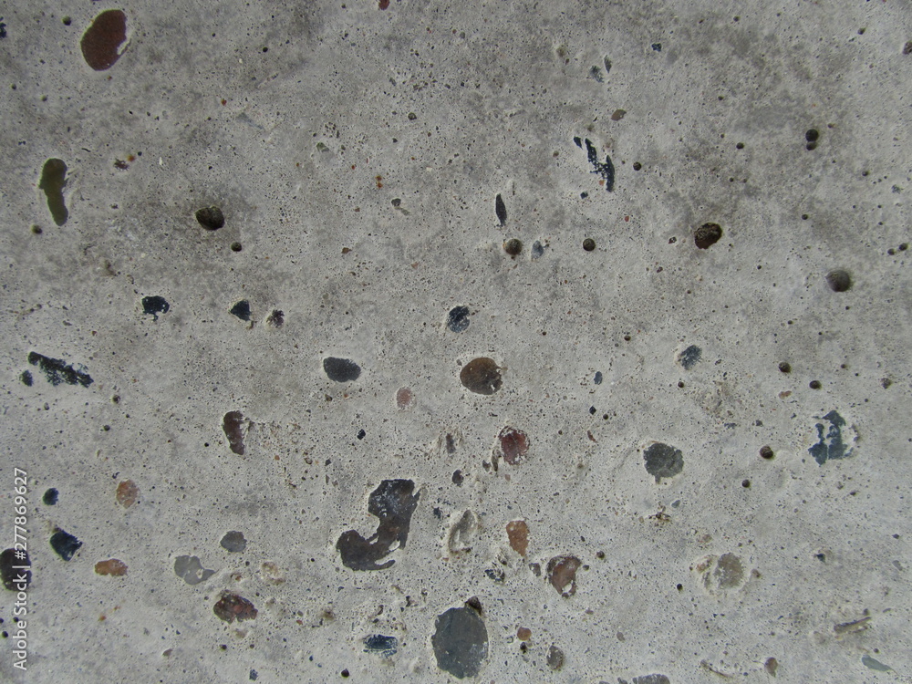 Concrete floor with small stones 