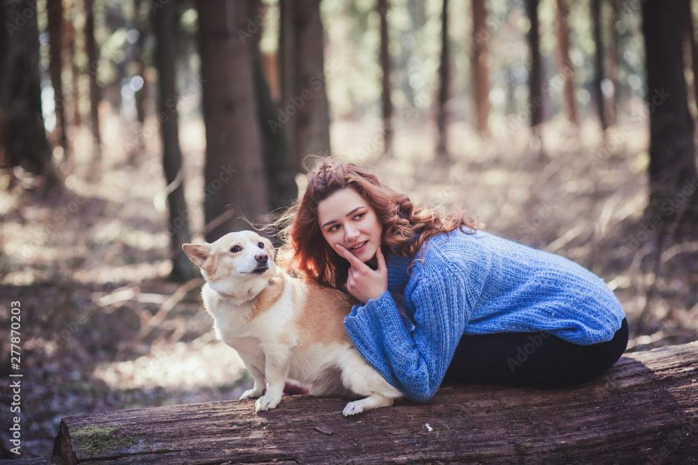 Beautiful woman playing with her dog. Outdoor portrait. Beautiful woman playing with her dog. Outdoor portrait.
