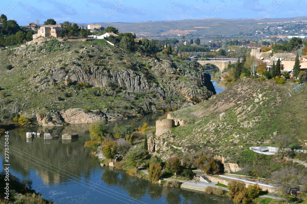 Beautiful green landscape with a river in the vicinity of Toledo.