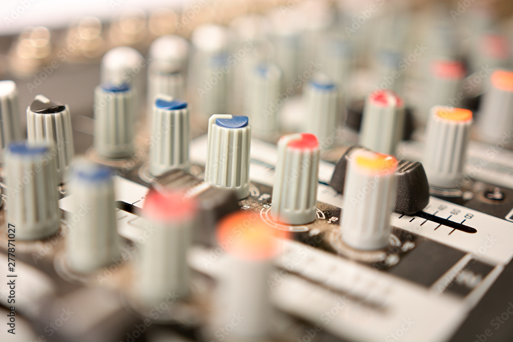 close-up of modern sound mixer in studio