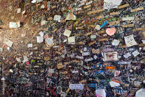Wall full of messages from lovers in Juliet`s House in Verona, Italy © zatletic