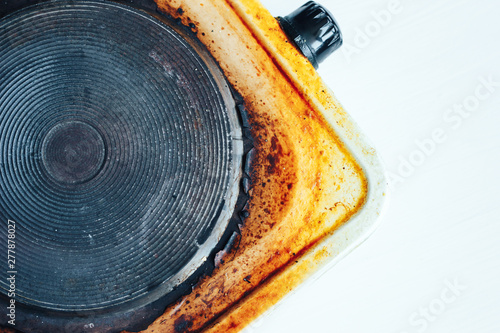 Wallpaper Mural Old rusty dirty fatty burner of electric hot plate Torontodigital.ca