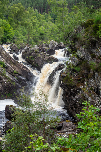 Rogie Falls are a series of waterfalls on the Black Water, a river in Ross-shire in the Highlands of Scotland. The falls are about 2 km north-west of the village of Contin, next to the A835 road. They photo