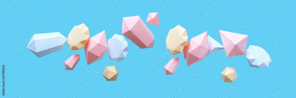 polygonal diamonds made of paper on a blue background polygonal diamonds made of paper on a blue background