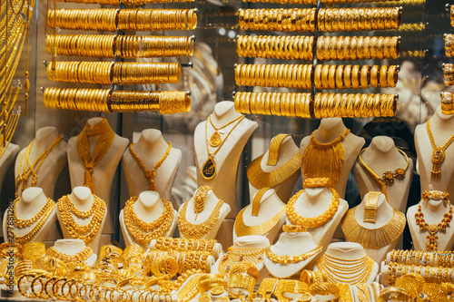 .Rows of gold jewelery as a backdrop in a jewelry store at the Grand Bazaar. Istanbul, Turkey.