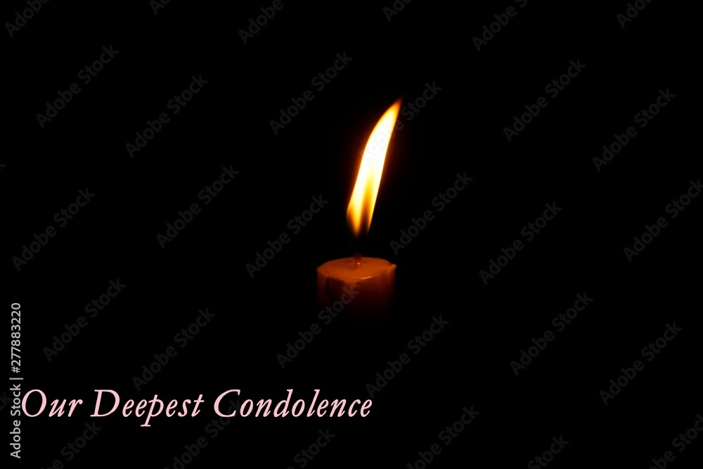 burning candle in the form of heart on black background burning candle in the form of heart on black background