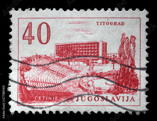 Stamp printed in Yugoslavia, shows Titograd (Podgorica) Hotel and Open-Air Theater in Cetinje, circa 1958