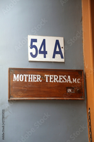 Sign on the entrance to Mother House, the residence of Mother Teresa in Kolkata, West Bengal, India  photo