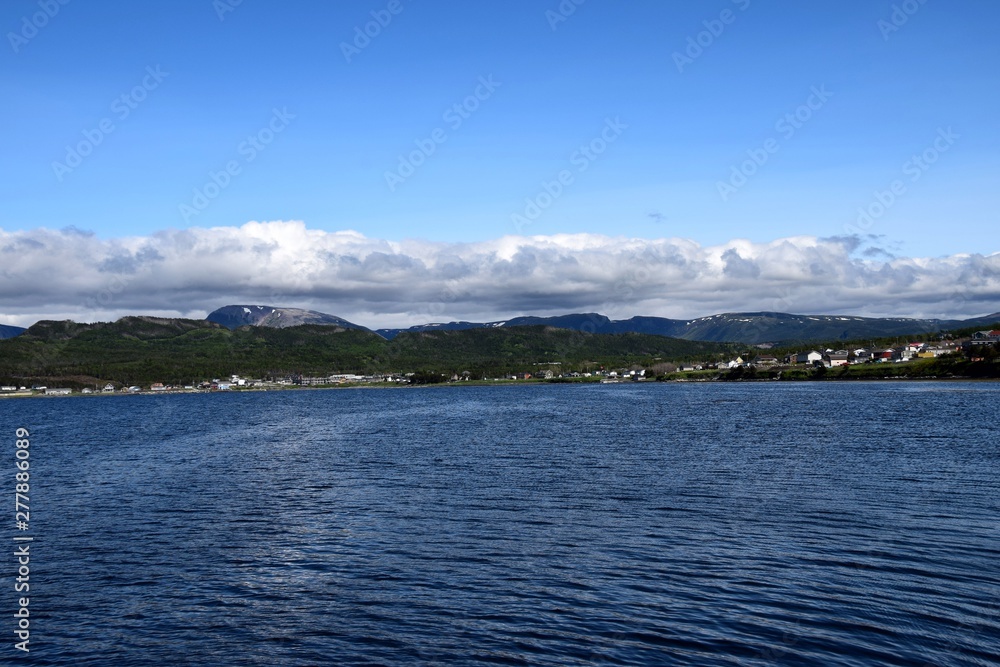 view across the bay towards the town of Rocky Harbour, scenery along the Viking Trail in the Gros Morne National Park, Newfoundland and Labrador, Canada