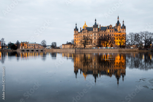 Schwerin, Germany. Schwerin Castle Palace (Schweriner Schloss), reflected on Schweriner See lake, a World Heritage Site in Mecklenburg-West Pomerania