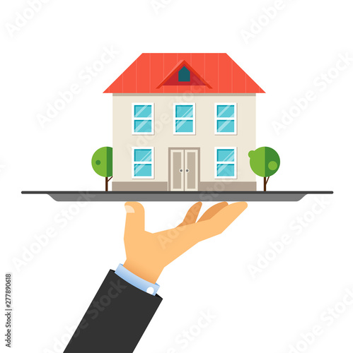 House on tray. Concept of selling house, mortgages, property auctions