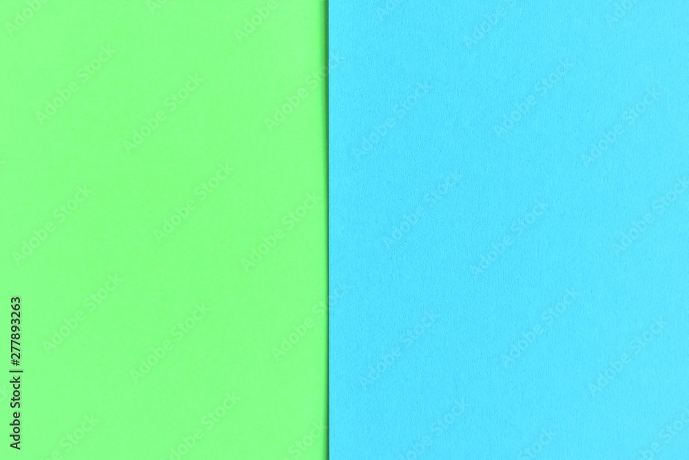 Two tone paper background with green and blue color. Blank colorful backdrop with empty space for image or text. Mockup concept. Neon empty paper background. Clean blue and green wallpaper Two tone paper background with green and blue color. Blank colorful backdrop with empty space for image or text. Mockup concept. Neon empty paper background. Clean blue and green wallpaper