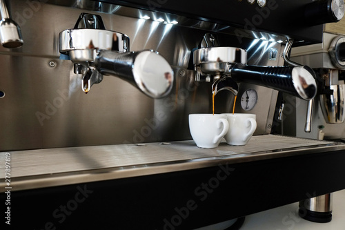 Close up of modern beautiful coffee machine with vintage style black and chrome metal texture design Fototapeta