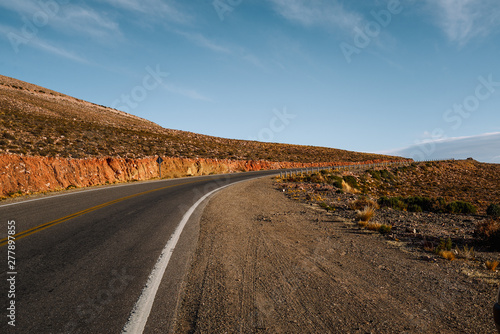 Cinematic road landscape. Humahuaca valley, Altiplano, Argentina. Misty road