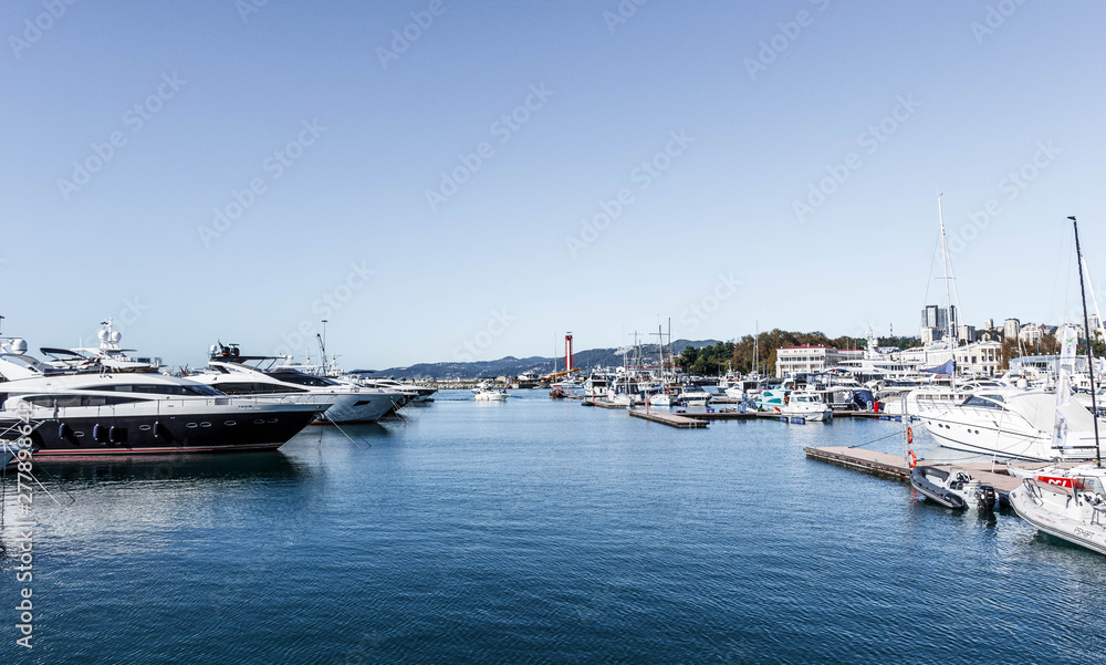 Yachts and boats on the pier near the Sochi seaport