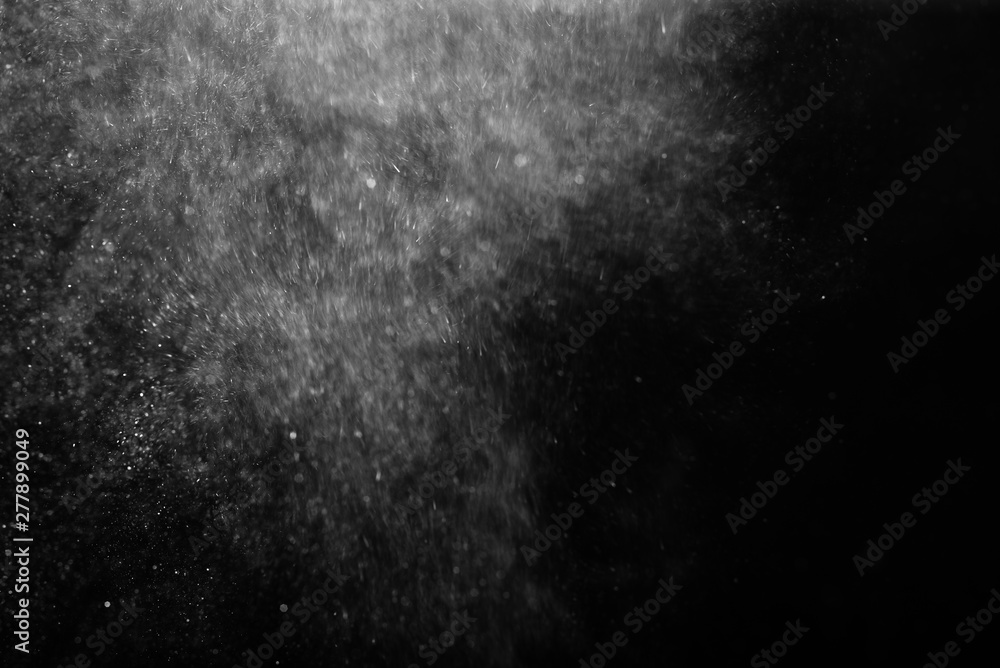 White powder explosion on black background. White powder explosion on black background.