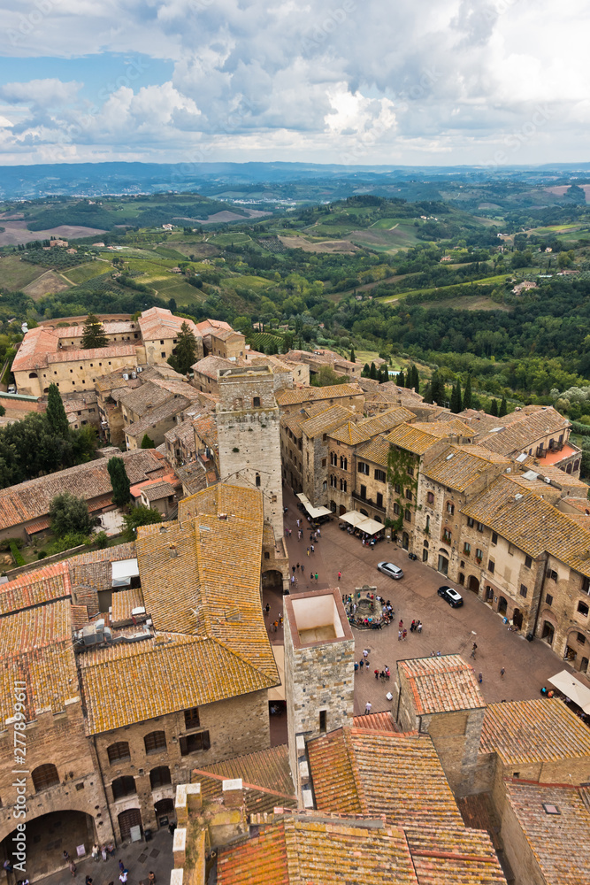 Panoramic aerial view of the city and surrounding countryside from the towers of San Gimignano in Tuscany, Italy