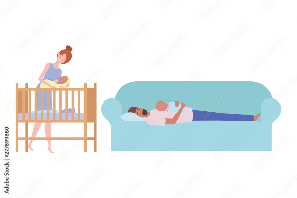 young couple sitting on sofa with newborn baby young couple sitting on sofa with newborn baby