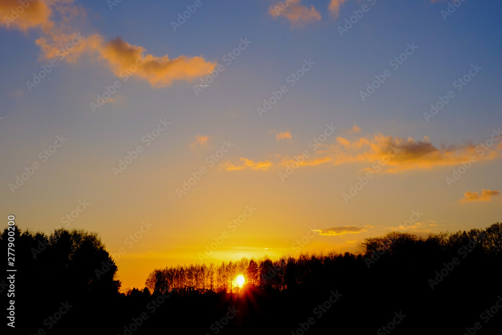 Natural Sunset or Sunrise Over Field