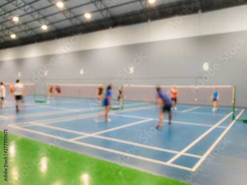 badminton court with burred players badminton