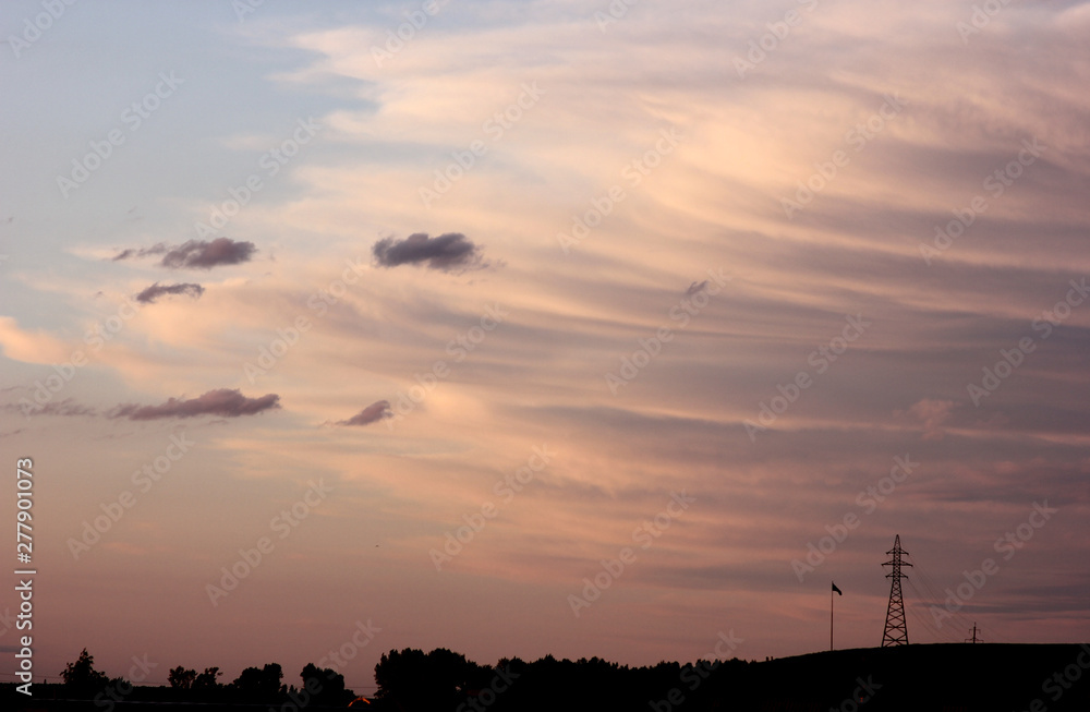 beautiful clouds of unusual shape at sunset