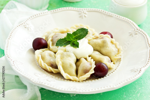 Dumplings with cherries. Ukrainian and Belarusian cuisine.