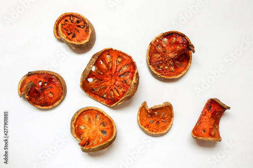 Dried bale fruits or dried bael fruits on Isolated white background , dried food