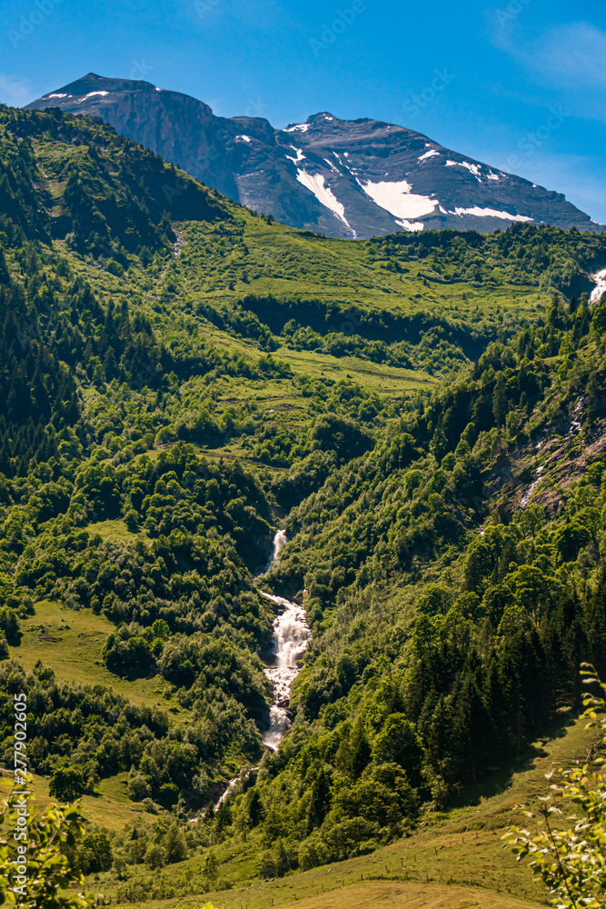 Beautiful alpine view with a waterfall at the famous Grossglockner High Alpine Road, Salzburg, Austria