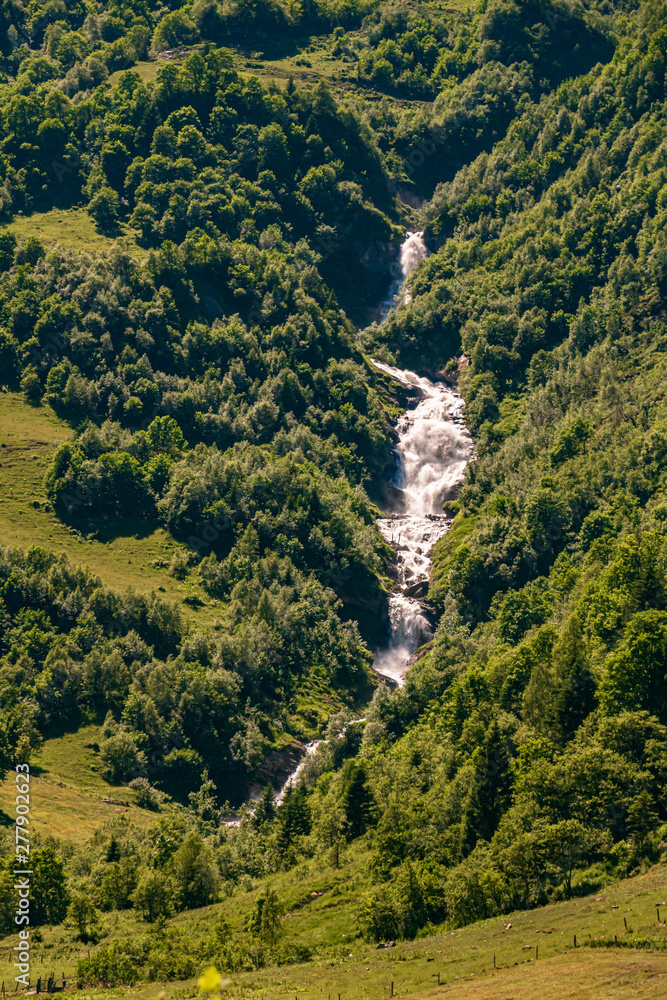 Beautiful alpine view with a waterfall at the famous Grossglockner High Alpine Road, Salzburg, Austria