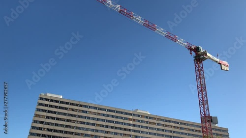 Verticle panning video of a large construction crane in the Part Dieu area, the Central Business District of Lyon, France photo