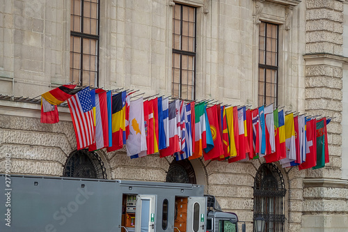 Flags of States on the wall of the government building. Vienna. Austria.