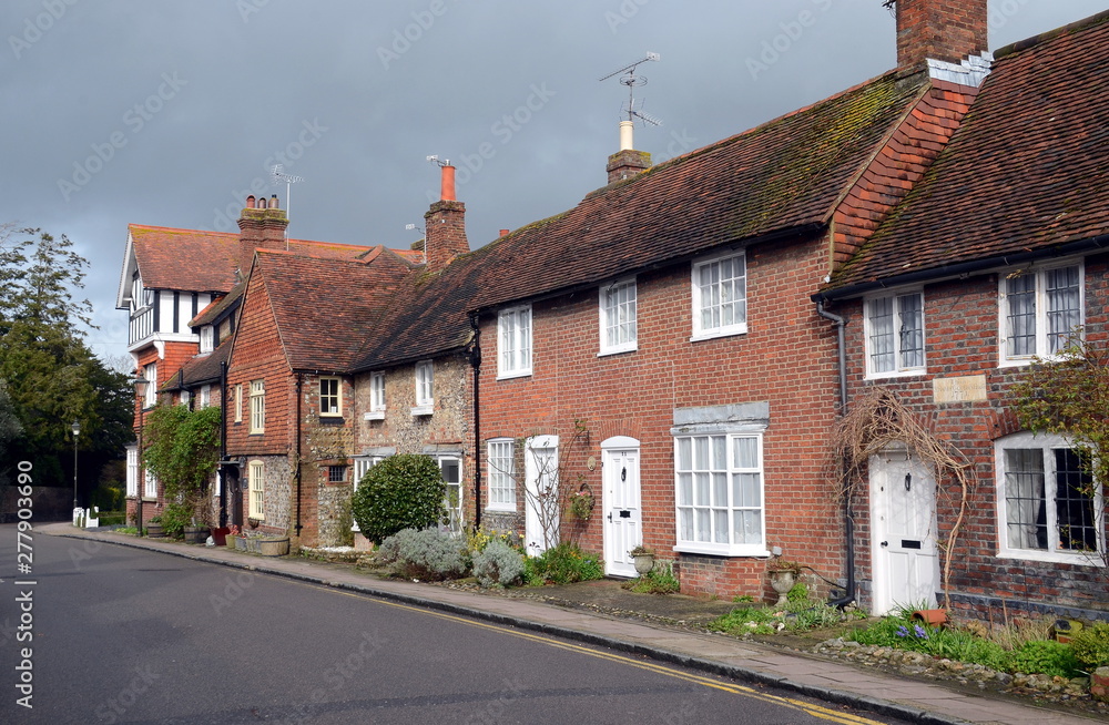 Arundel, United Kingdom - March 29, 2015 - Row of typical English houses with traditional streets and architecture in a small town of Arundel.