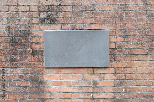 Wallpaper Mural Blank iron house number plate on brick wall with weathered and stained texture background. Torontodigital.ca