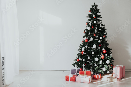 Christmas holidays New Year Family holidays Decorating tree. © dmitriisimakov