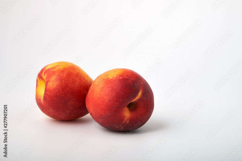 Ripe juicy nectarines isolated on white background Ripe juicy nectarines isolated on white background