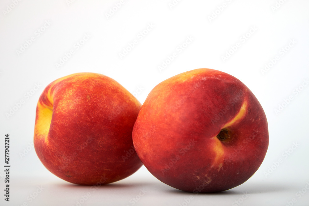 Ripe juicy nectarines isolated on white background Ripe juicy nectarines isolated on white background