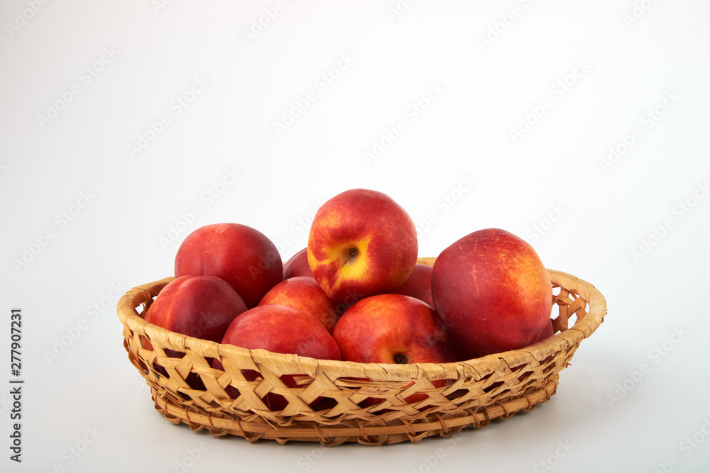 Ripe juicy nectarines isolated on white background Ripe juicy nectarines isolated on white background