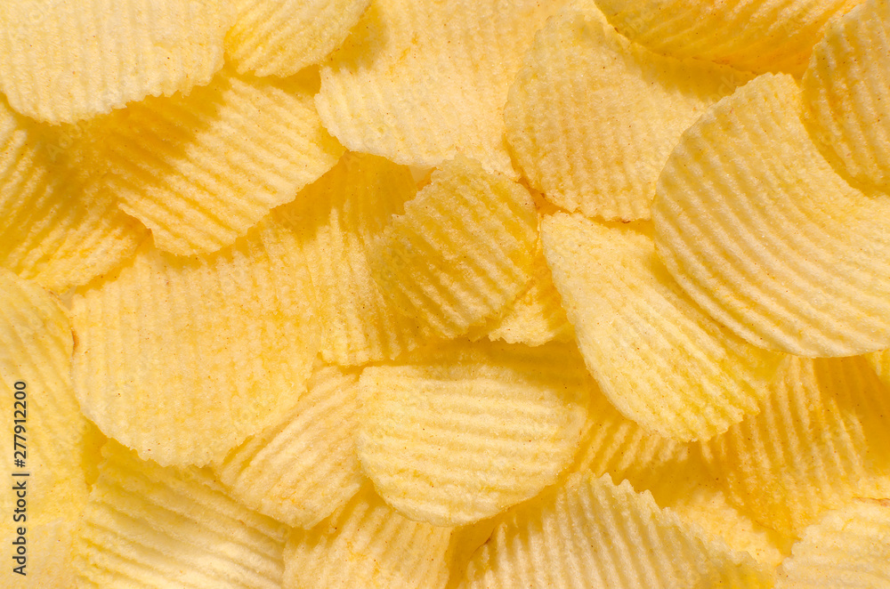 golden crunchy chips, food background, close up golden crunchy chips, food background, close up