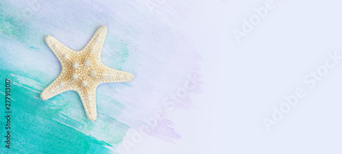 vacation and summer concept star fish banner with watercolor turquoise blue summer flat lay background.