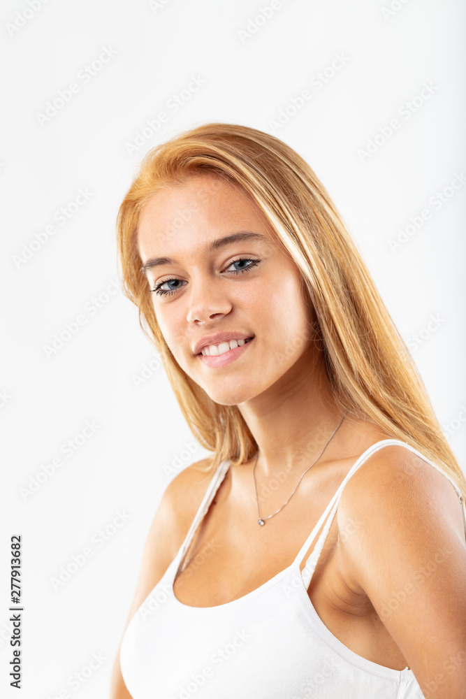 Pretty young blond student with a friendly smile Pretty young blond student with a friendly smile