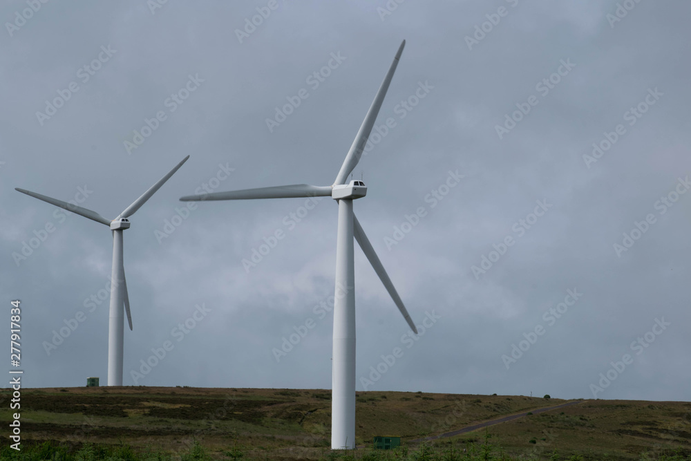 Wind turbines on Heather Moor near the coastline, Scotland Wind turbines on Heather Moor near the coastline, Scotland