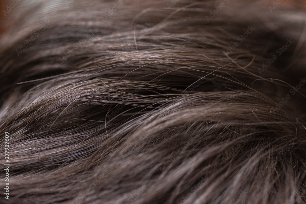 Closeup to dark and soft hair background Closeup to dark and soft hair background