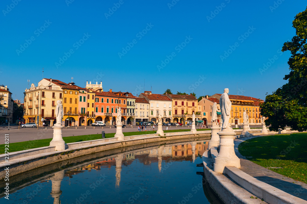 Prato della Valle. The largest public square in Italy featuring a central island surrounded by 70+ statues of historic residents. Padua, Italy.
