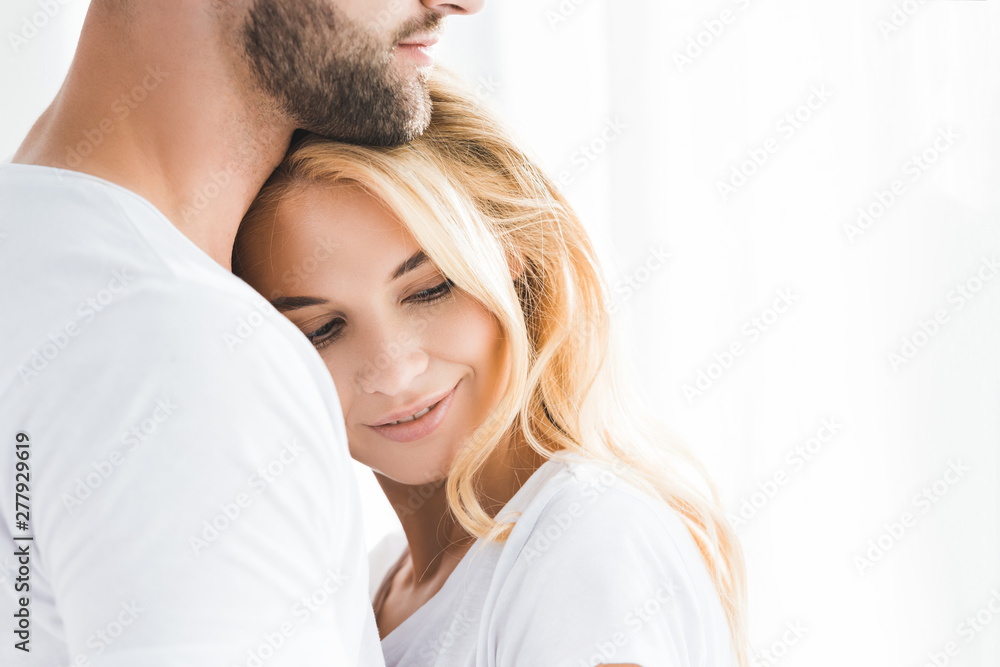 beautiful blonde woman leaning on bearded man with copy space beautiful blonde woman leaning on bearded man with copy space