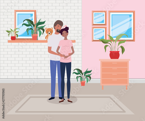 pregnancy couple in house place with drawer