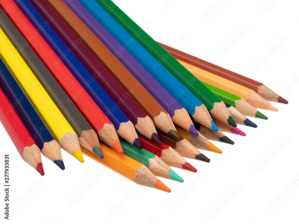 There are colored pencils on a diagonal in two floors. On a white background. Still life. Close-up. There are colored pencils on a diagonal in two floors. On a white background. Still life. Close-up.