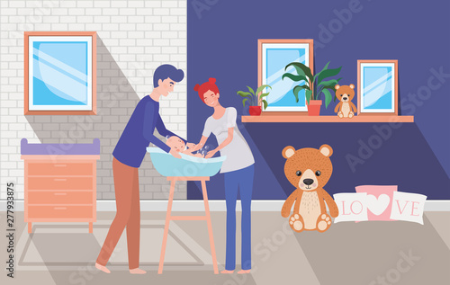 parents taking care of newborn baby with bath