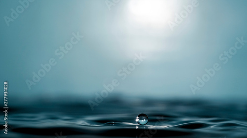 a drop on the surface of the water. One second before...
