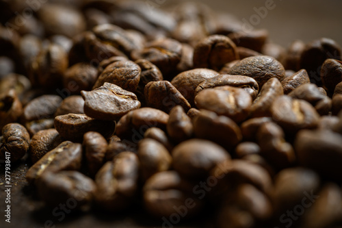 Coffee beans on wood background